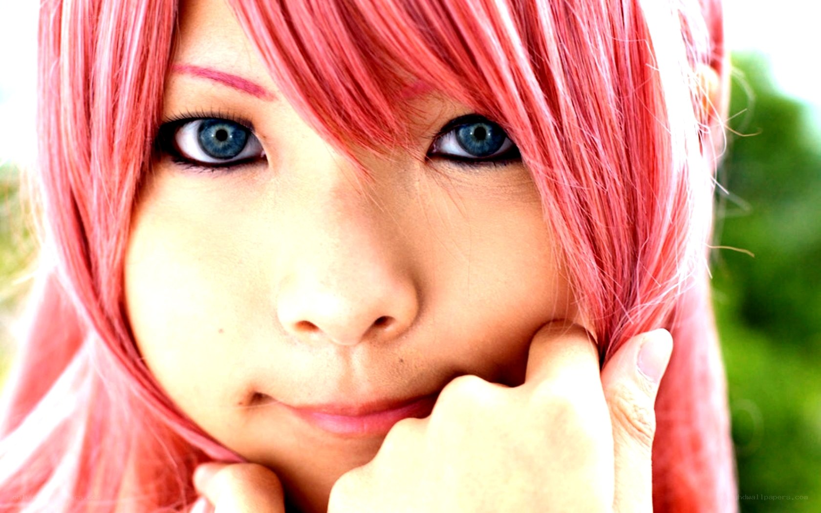 pink-haired person with blue eyes