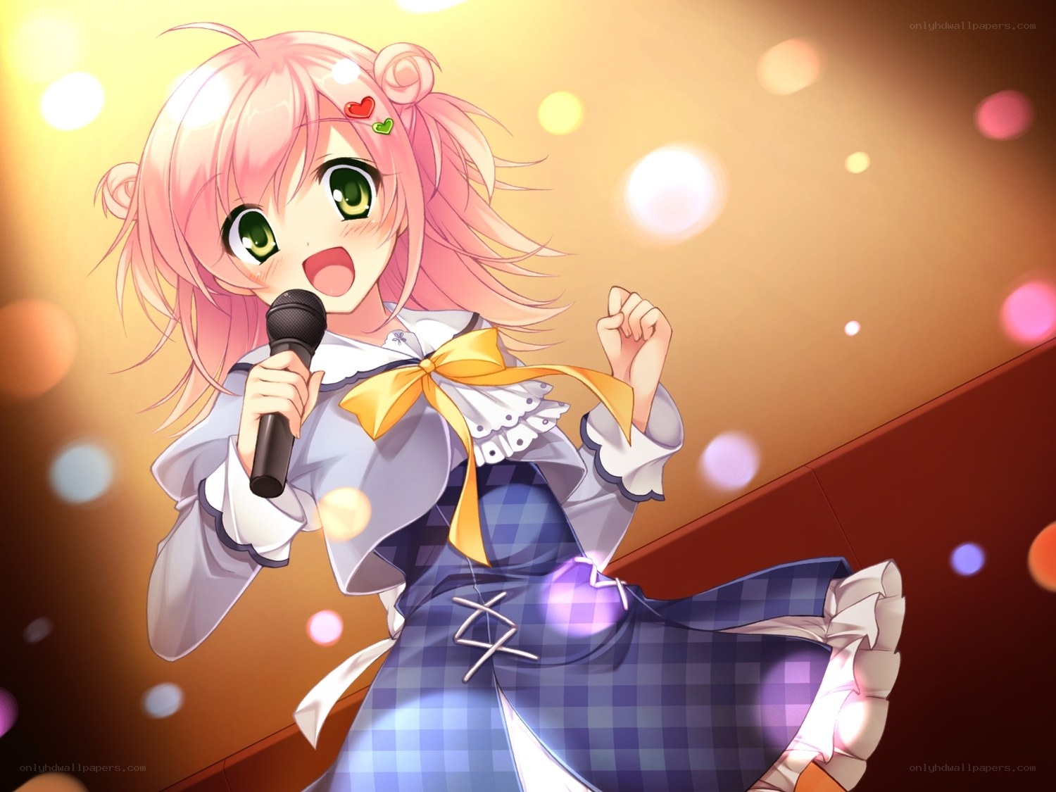 pink-haired singer performing