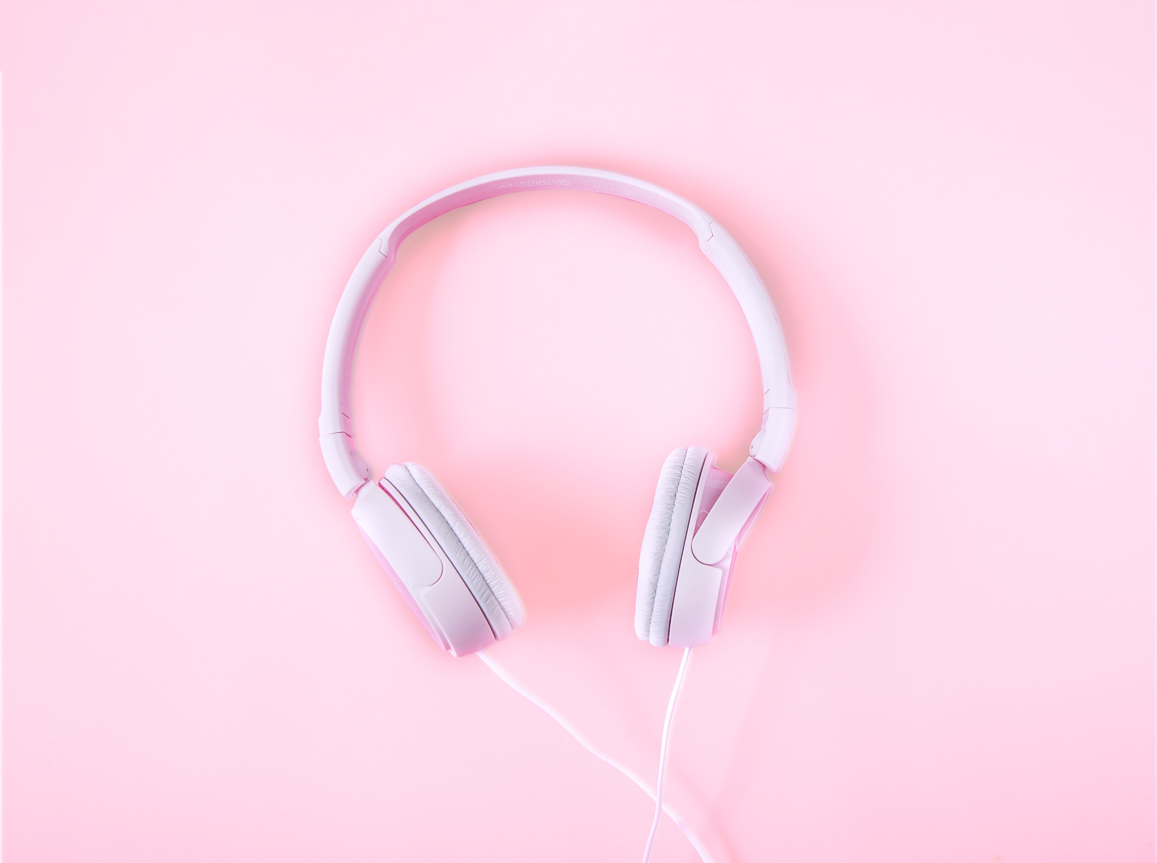 pink headphones on pink background