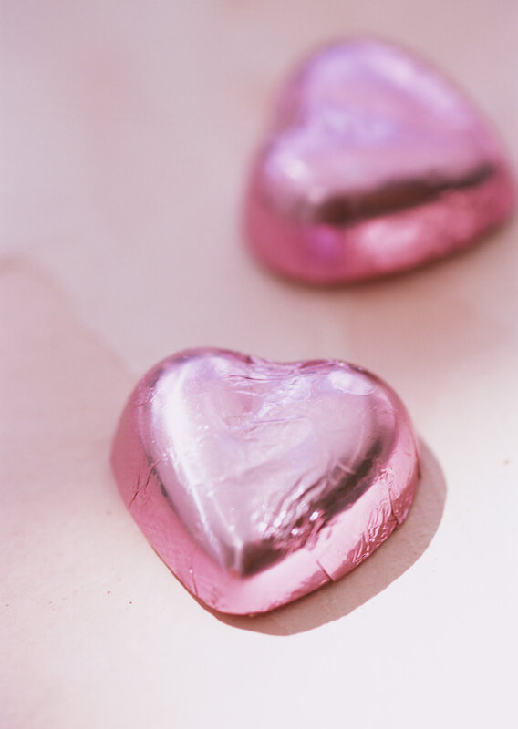 Pink heart-shaped chocolates
