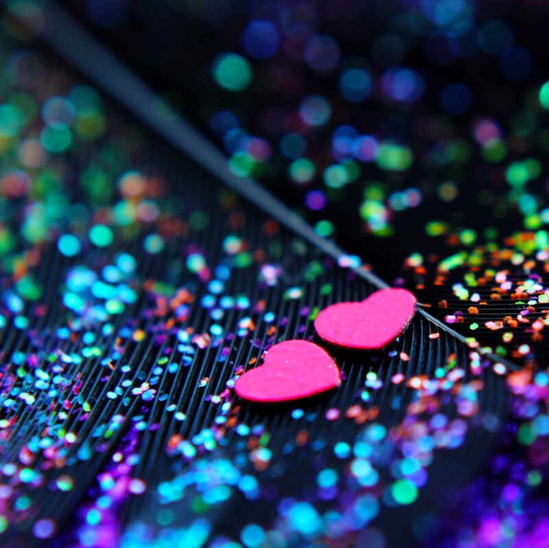 Pink Hearts on Feather — Black