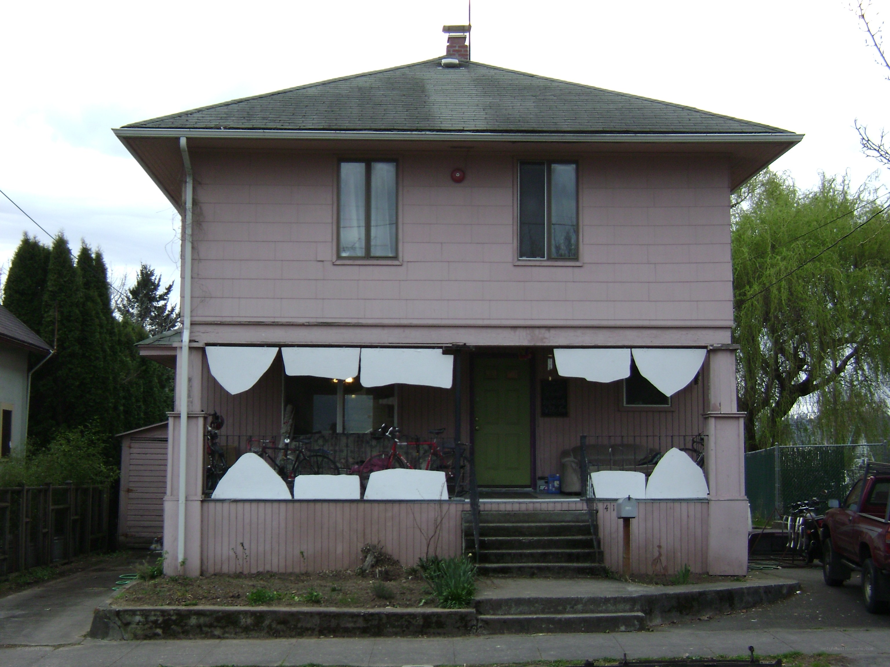Pink house with porch