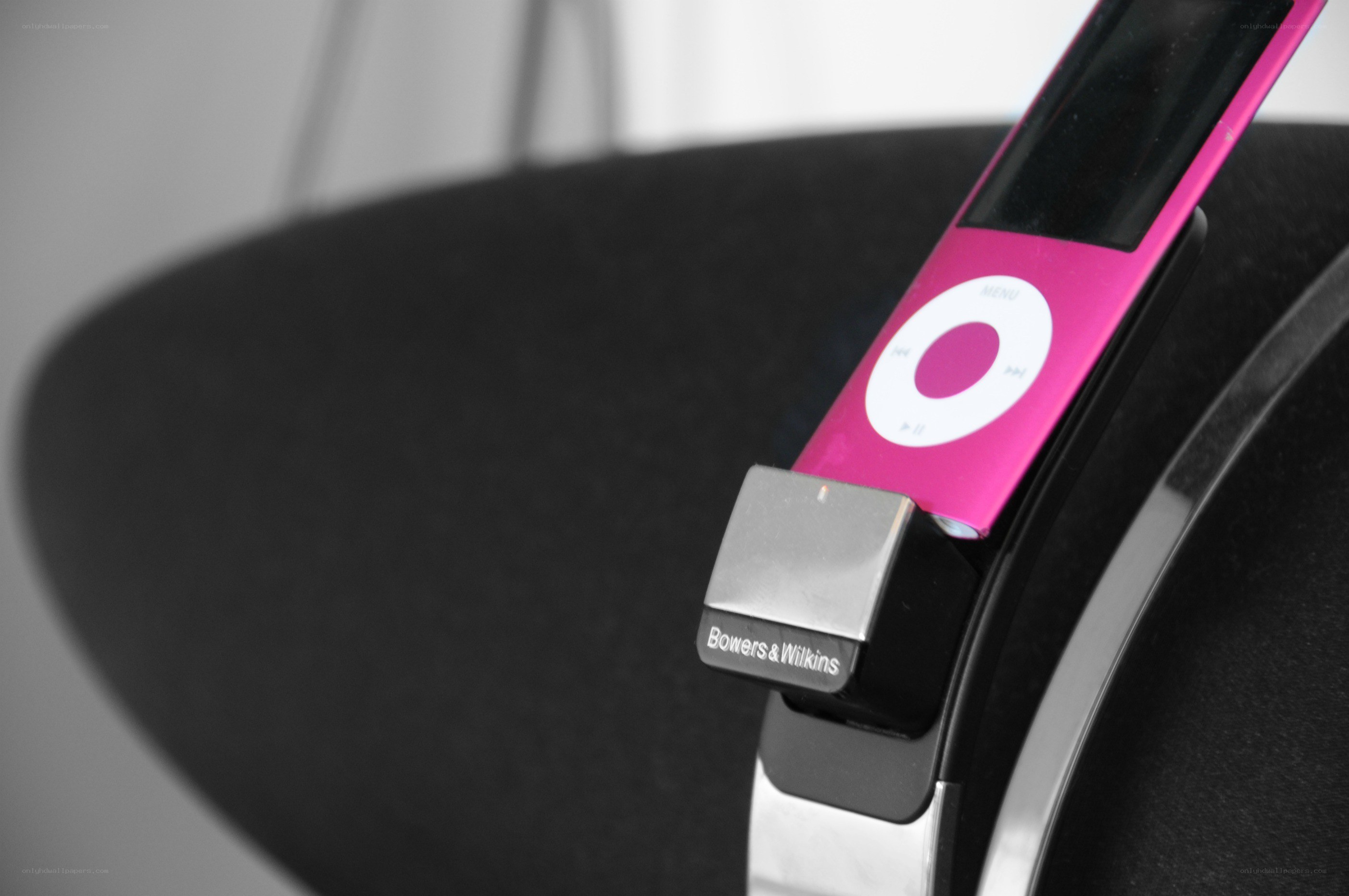 Pink iPod in speaker dock