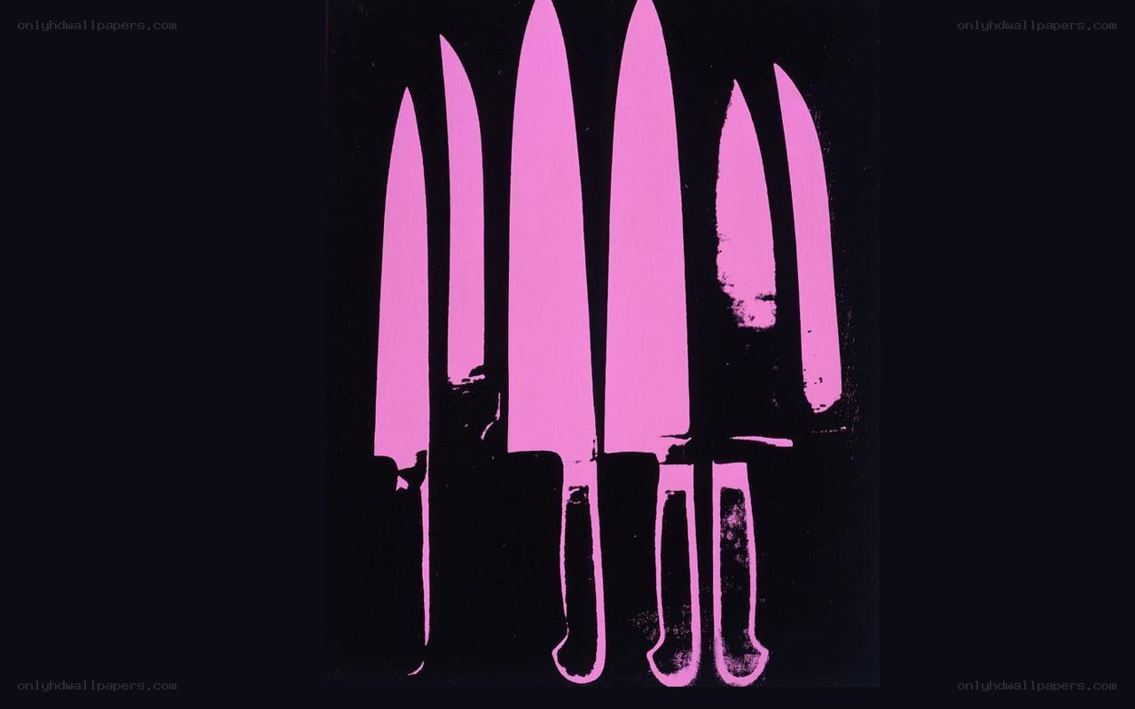 Pink knives on black background