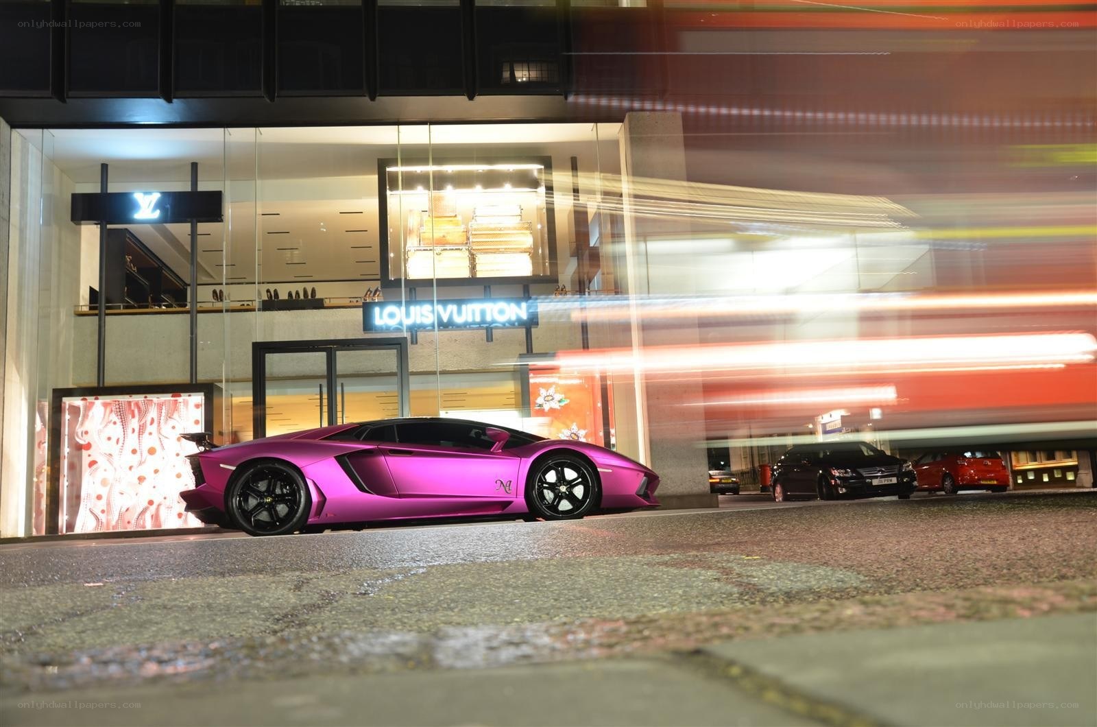 Pink Lamborghini outside Louis Vuitton