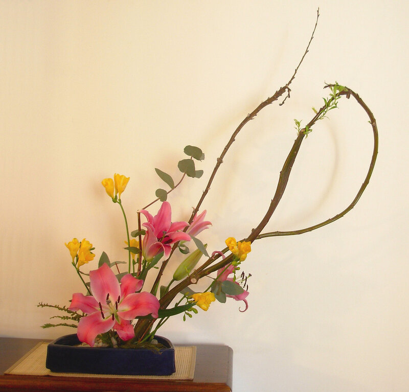 Pink Lilies and Yellow Flowers