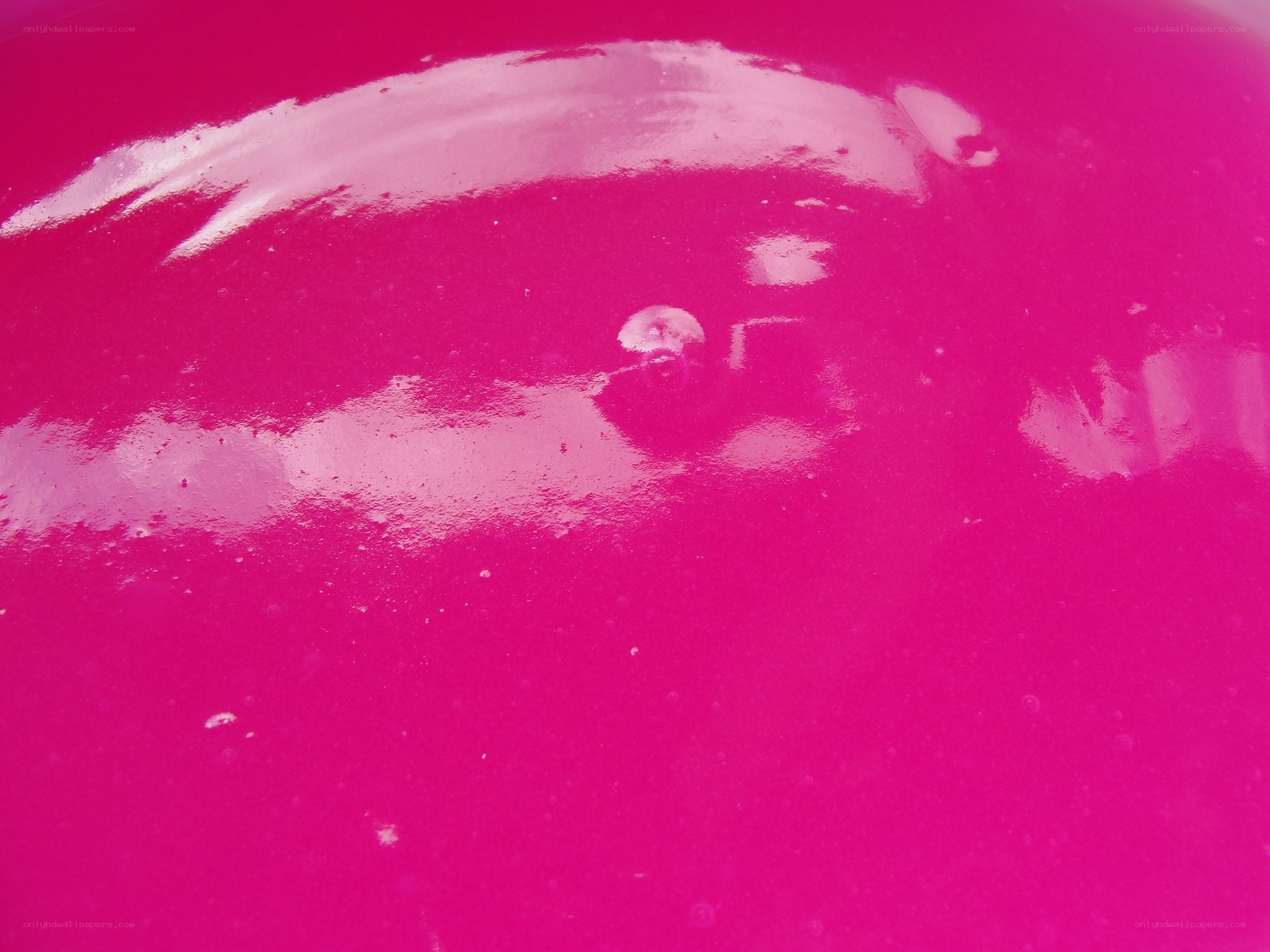 pink liquid surface