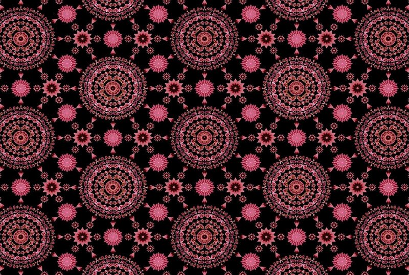 pink mandala pattern on black