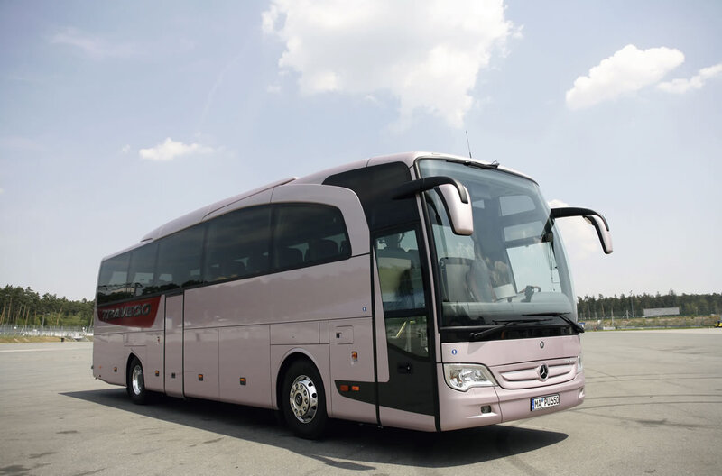 Pink Mercedes-Benz coach bus