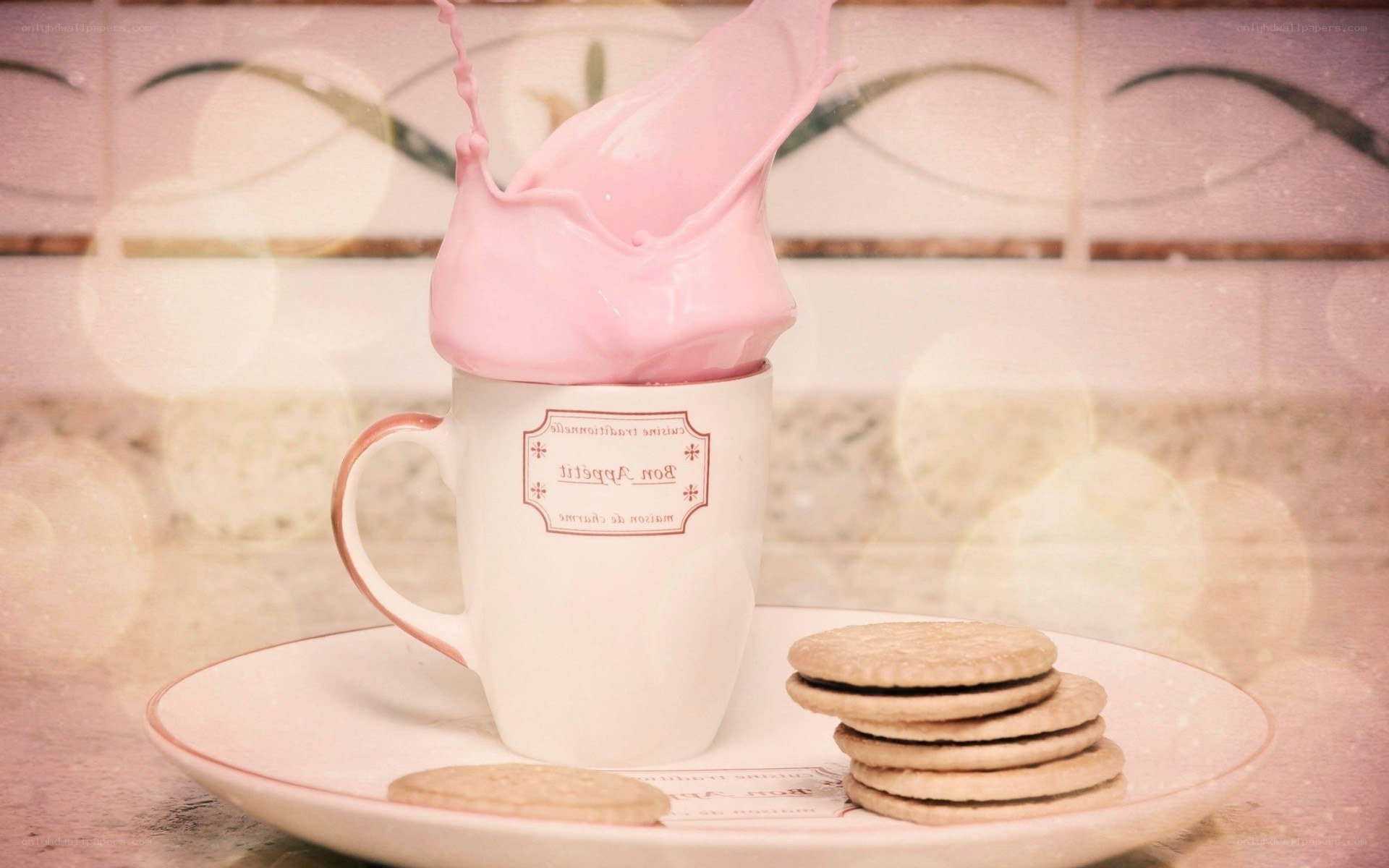 pink milk splash in cup