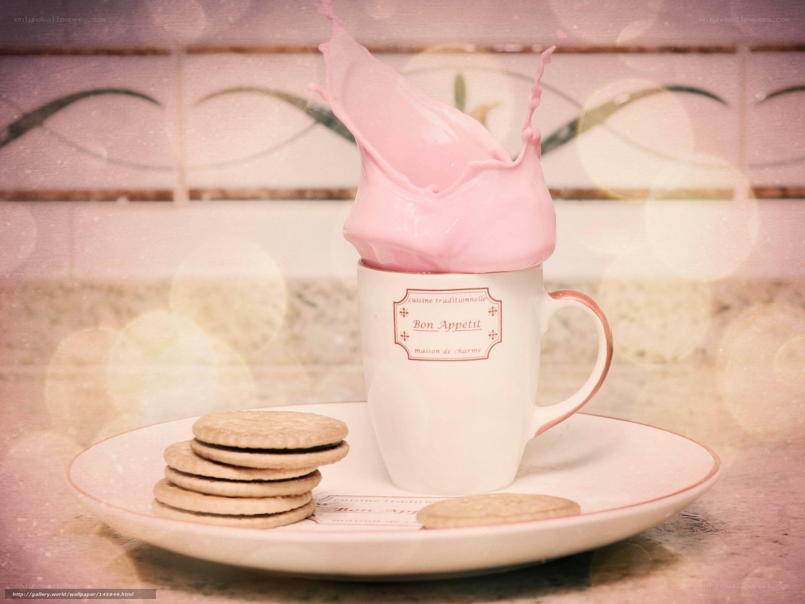 Pink milk splash in cup