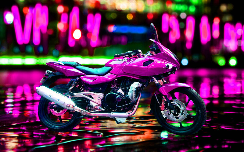 Pink Motorcycle on Wet Pavement
