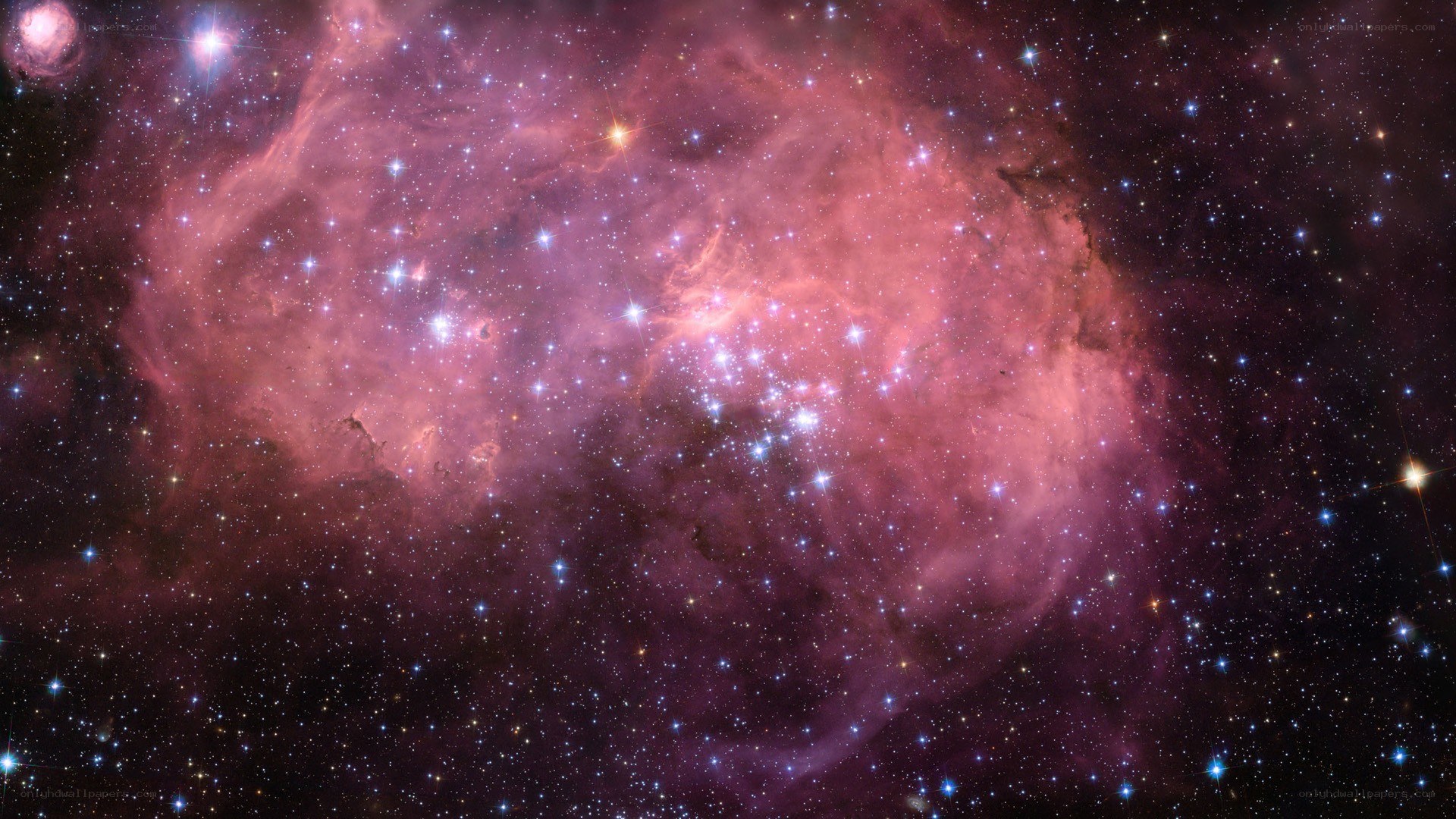 Pink nebula in space
