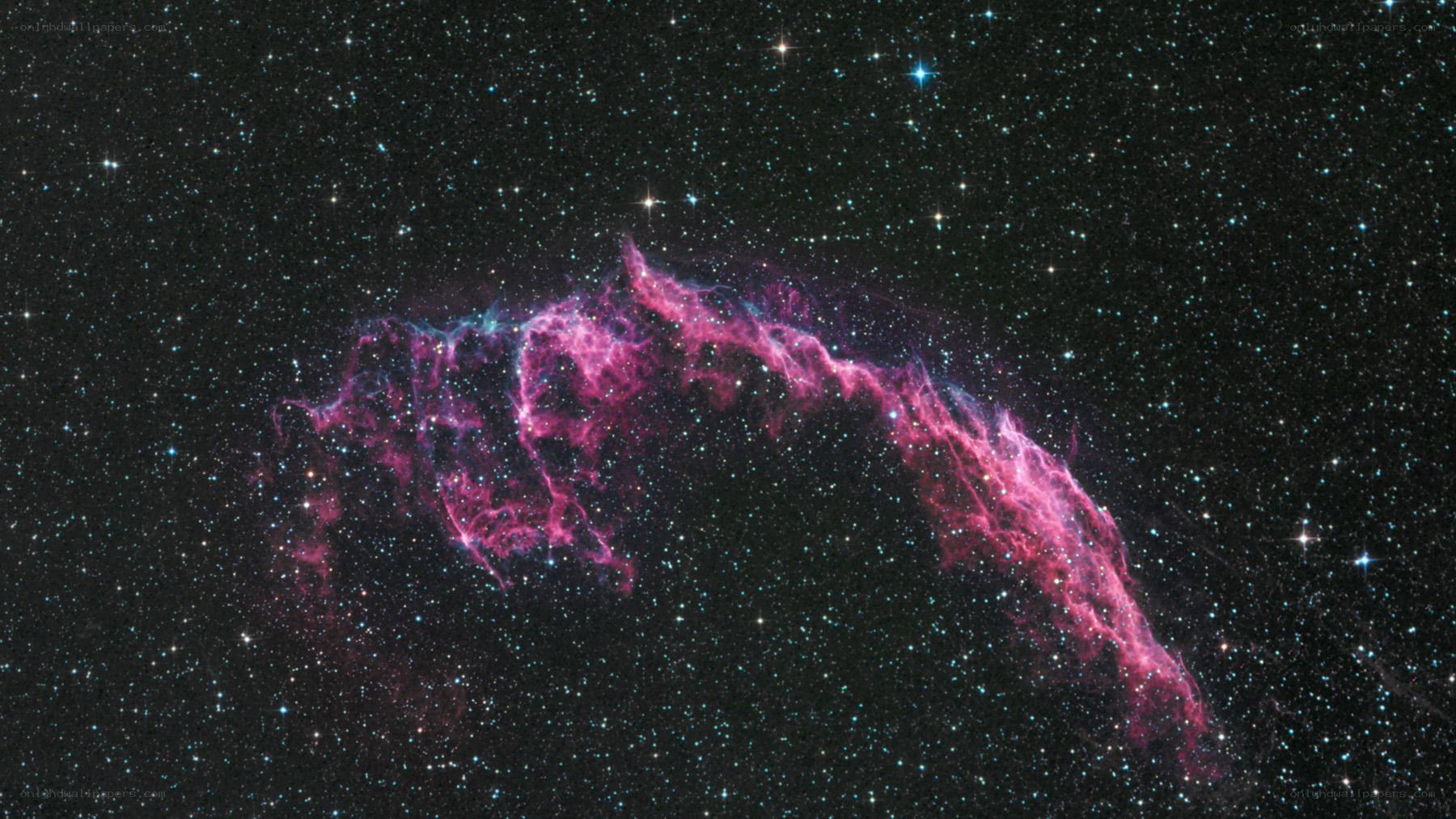 Pink nebula in starfield