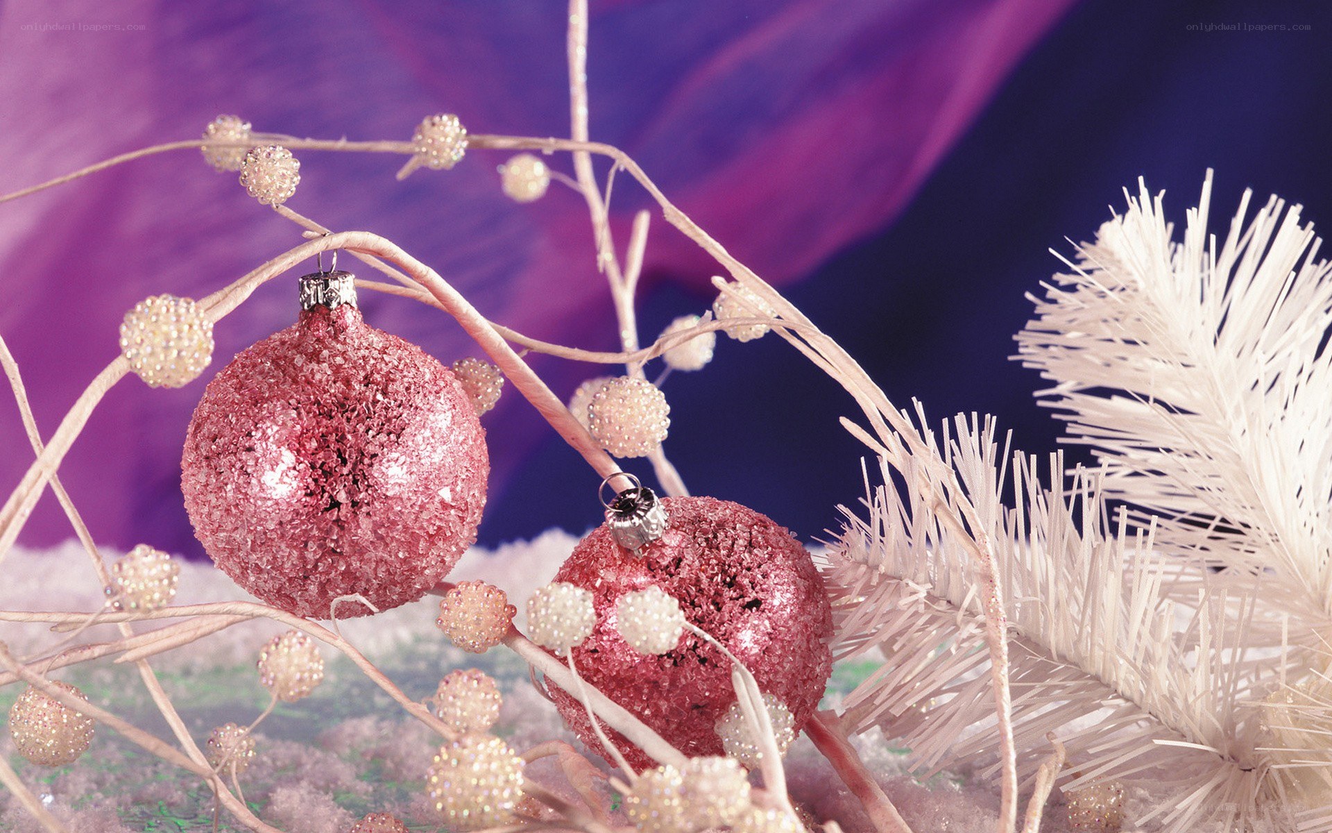 Pink ornaments on branches