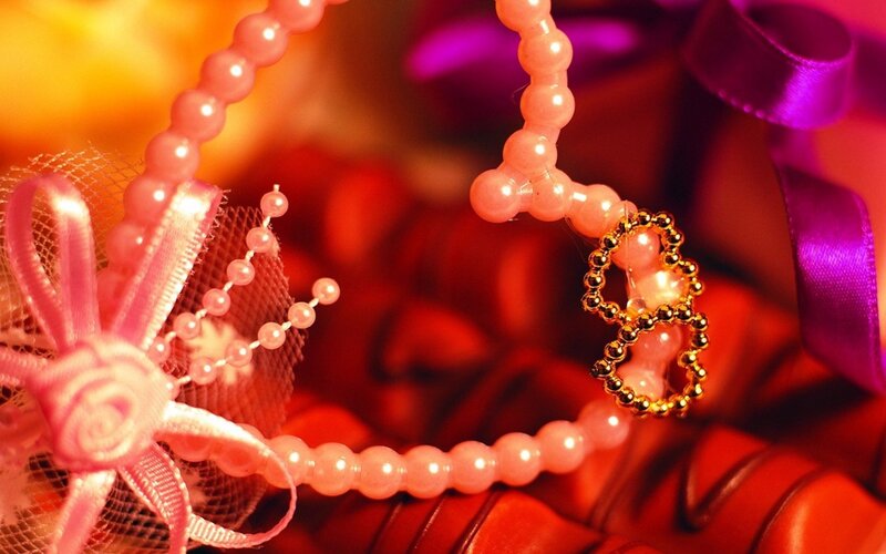 Pink pearl jewelry with ribbon
