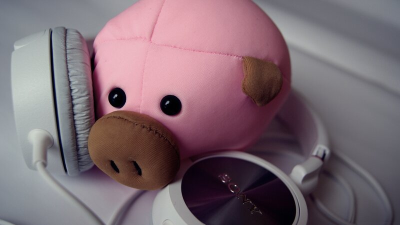 pink pig plush with headphones