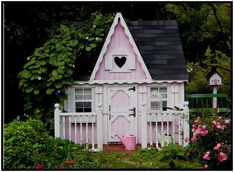 pink playhouse in garden