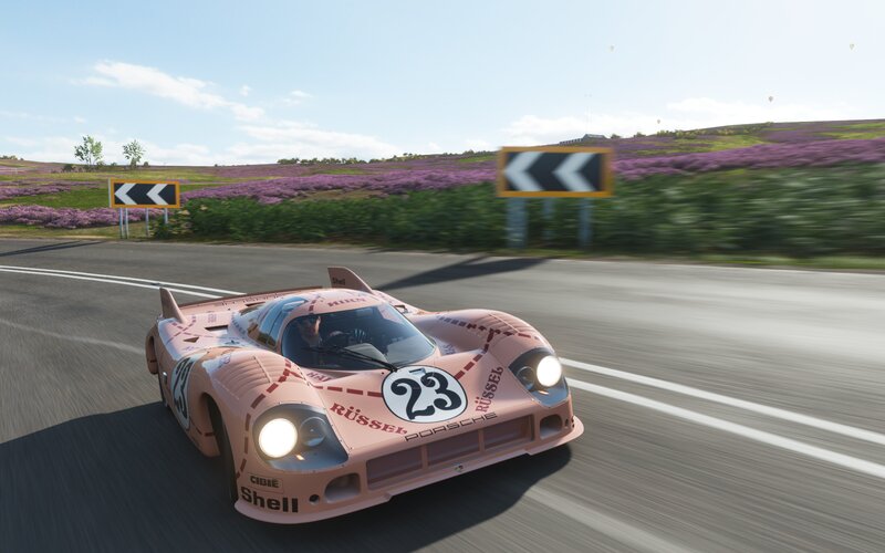 Pink Race Car on Road — Dynamic