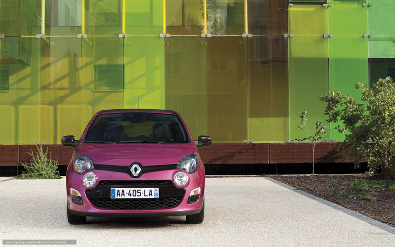 pink renault car in front of green building