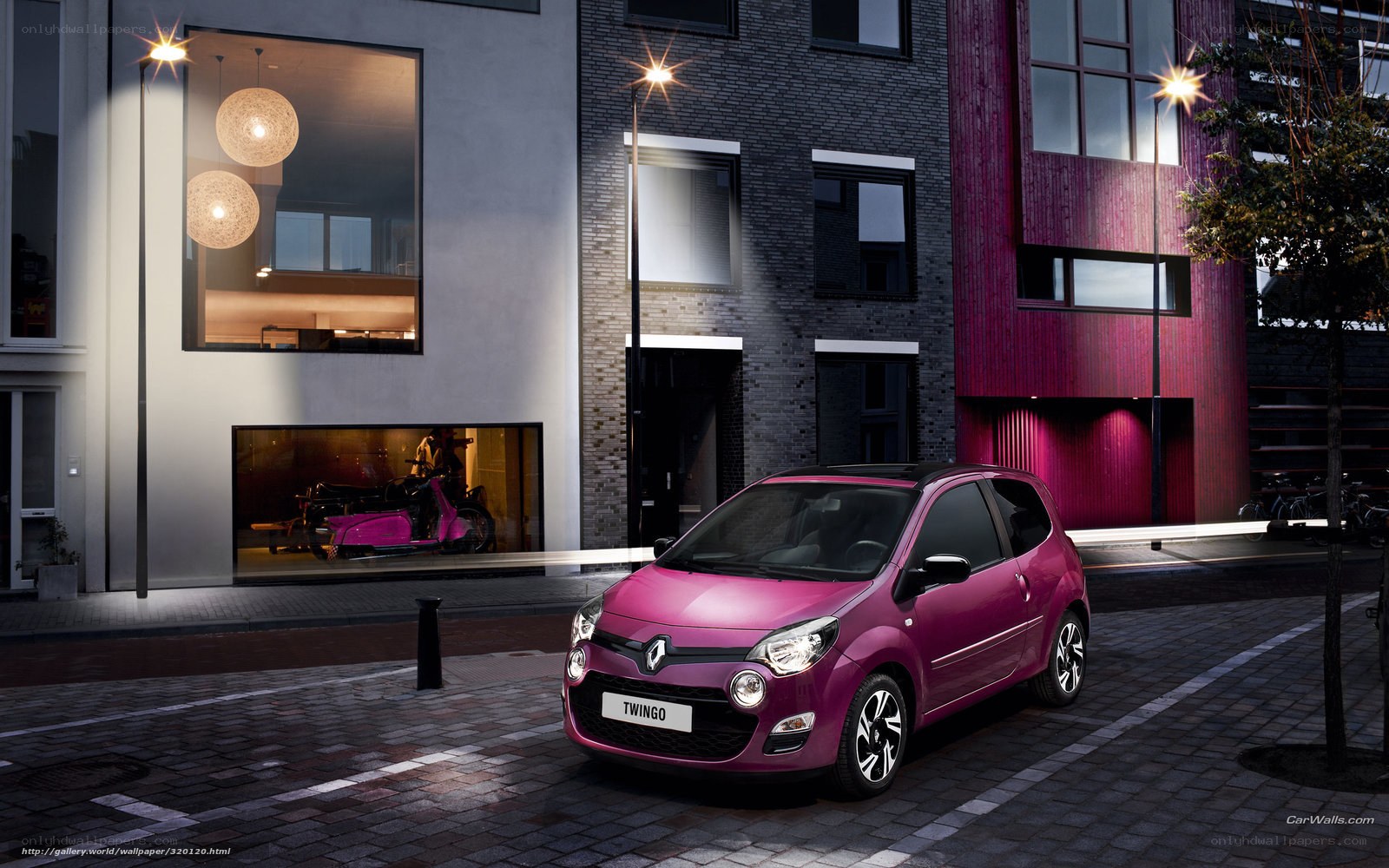 Pink Renault Twingo on city street