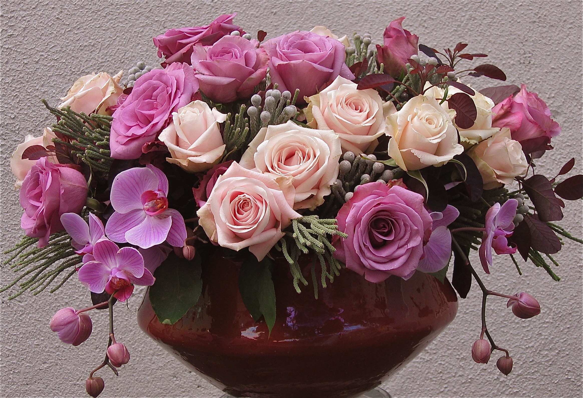 Pink rose and orchid arrangement