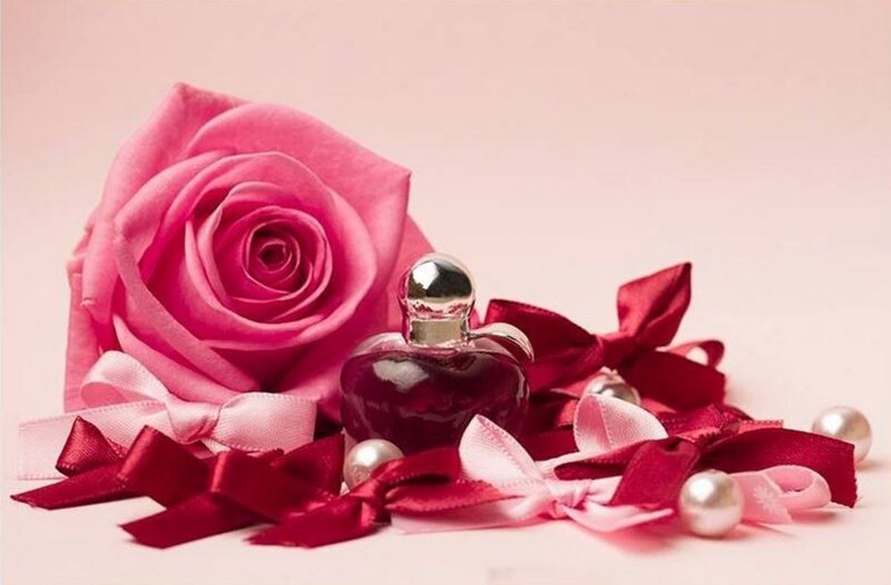 Pink Rose and Perfume Bottle