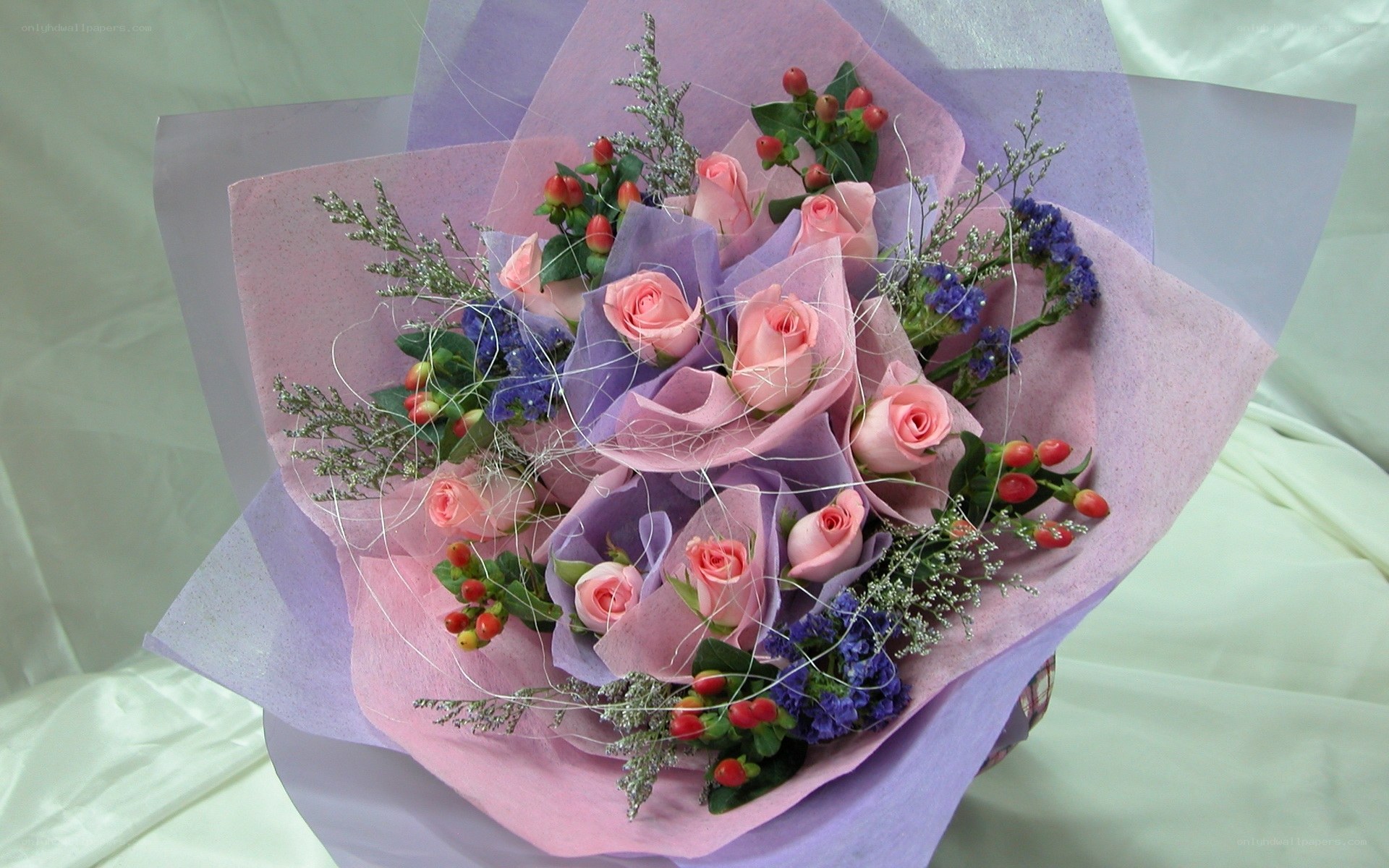 Pink rose bouquet with berries