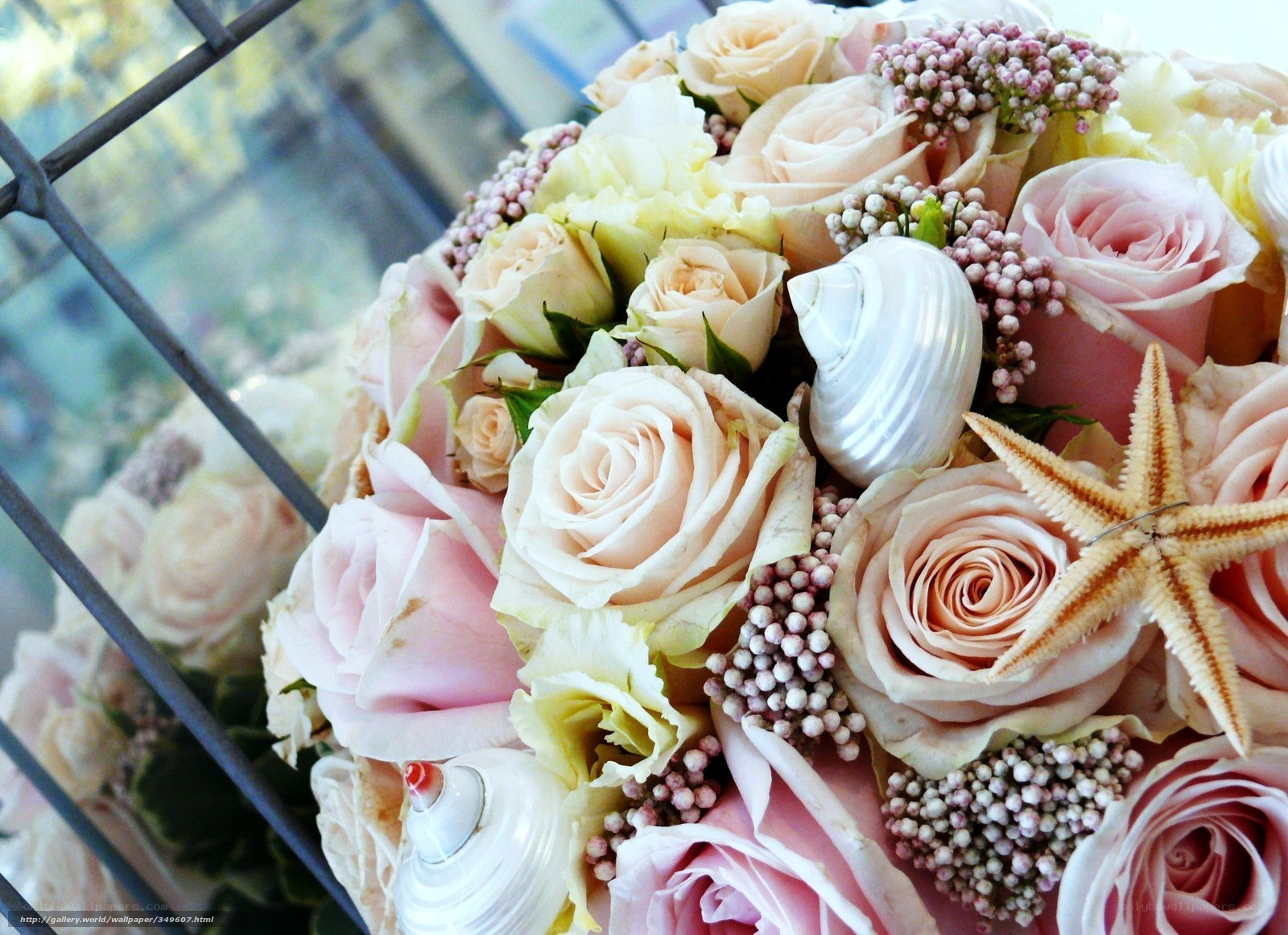 Pink rose bouquet with seashells