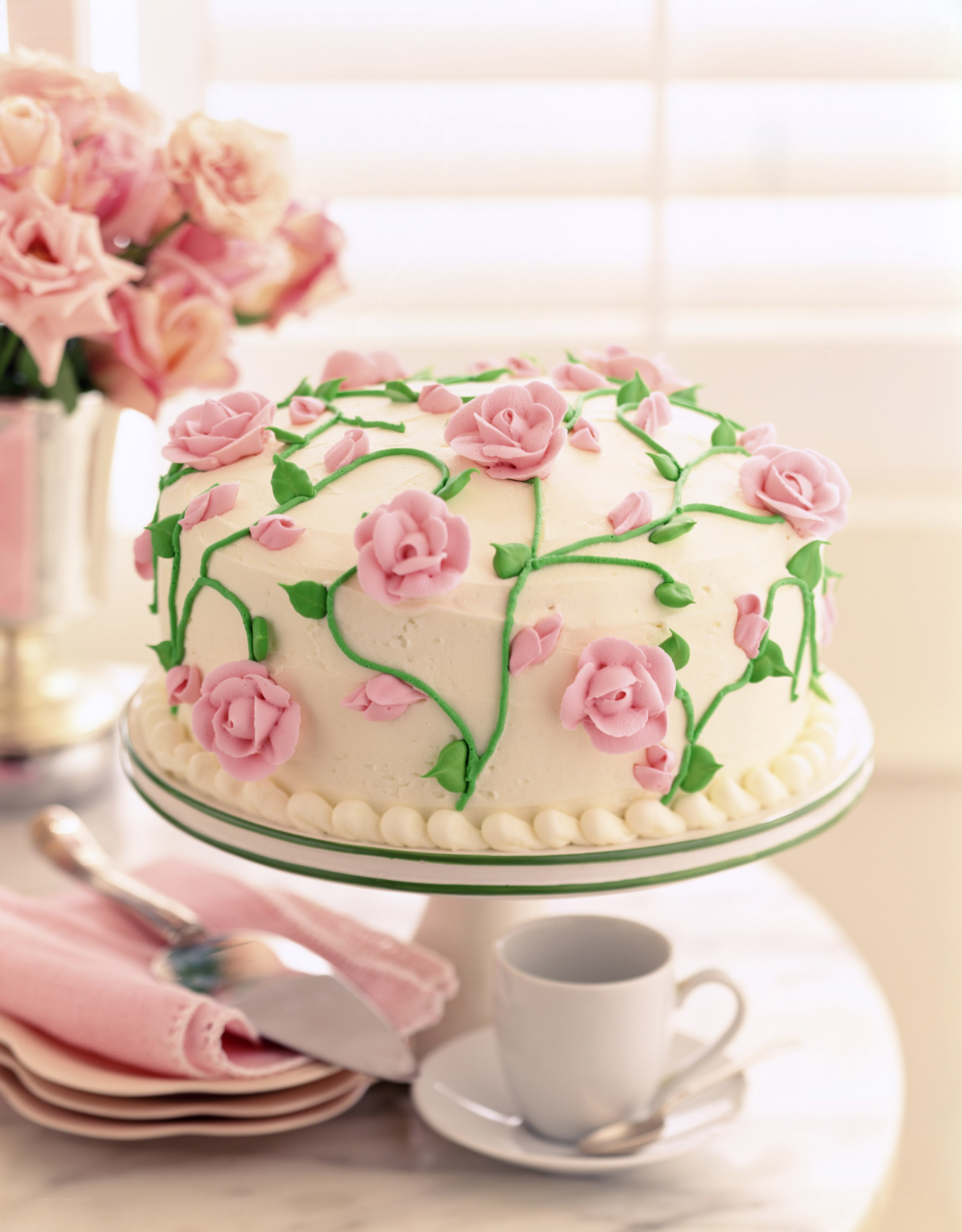 Pink rose cake on stand