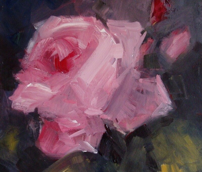 Pink rose in dark setting