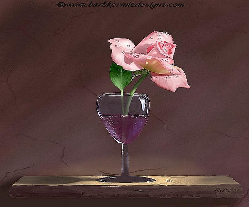 Pink rose in wine glass