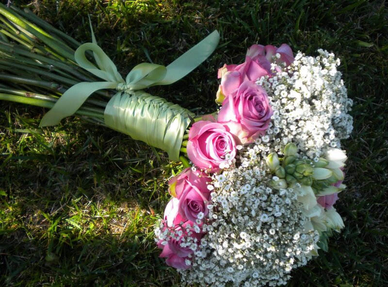 Pink roses and baby's breath bouquet