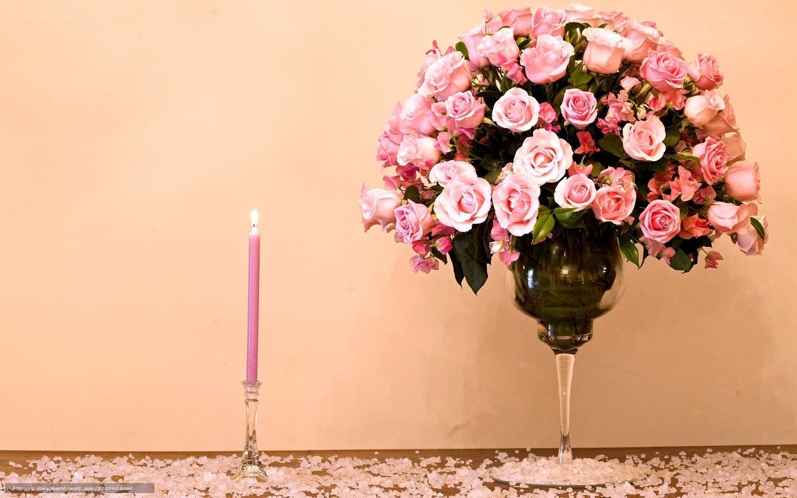 Pink roses and candle arrangement