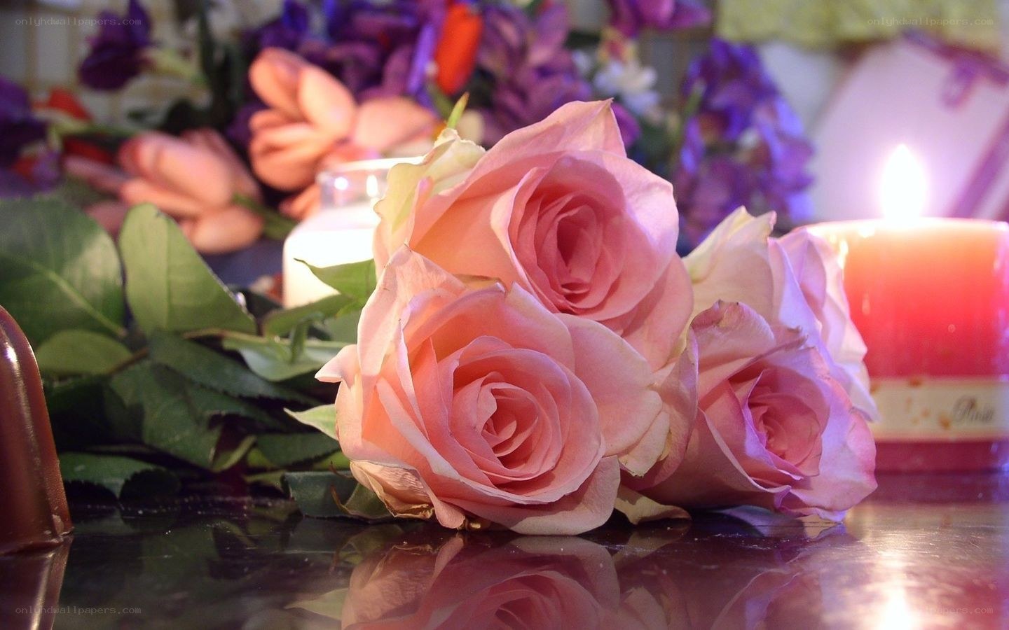 Pink roses and candles
