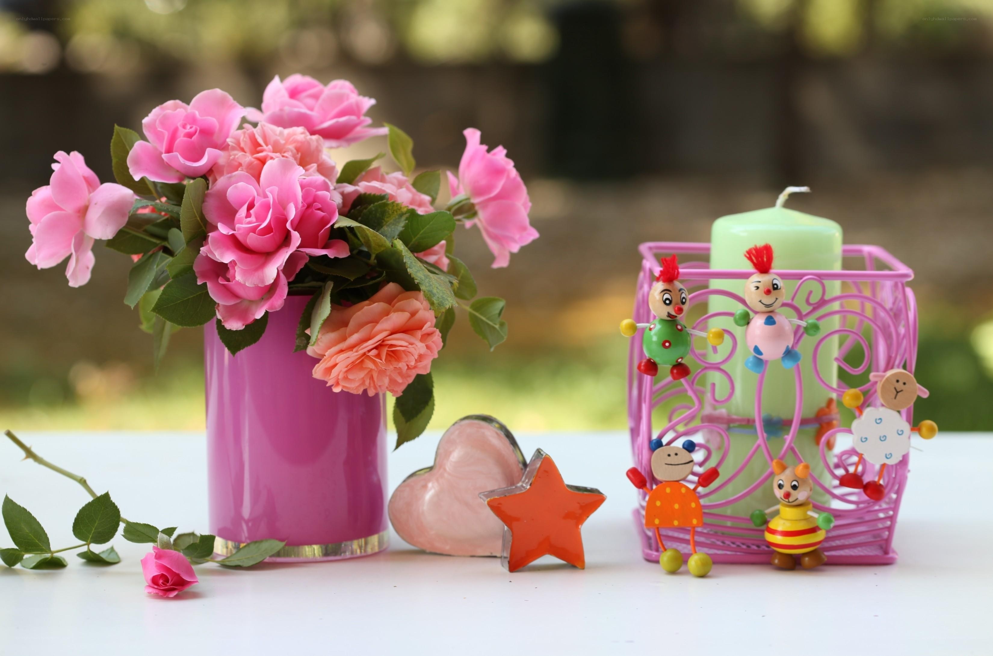 Pink roses and figurines