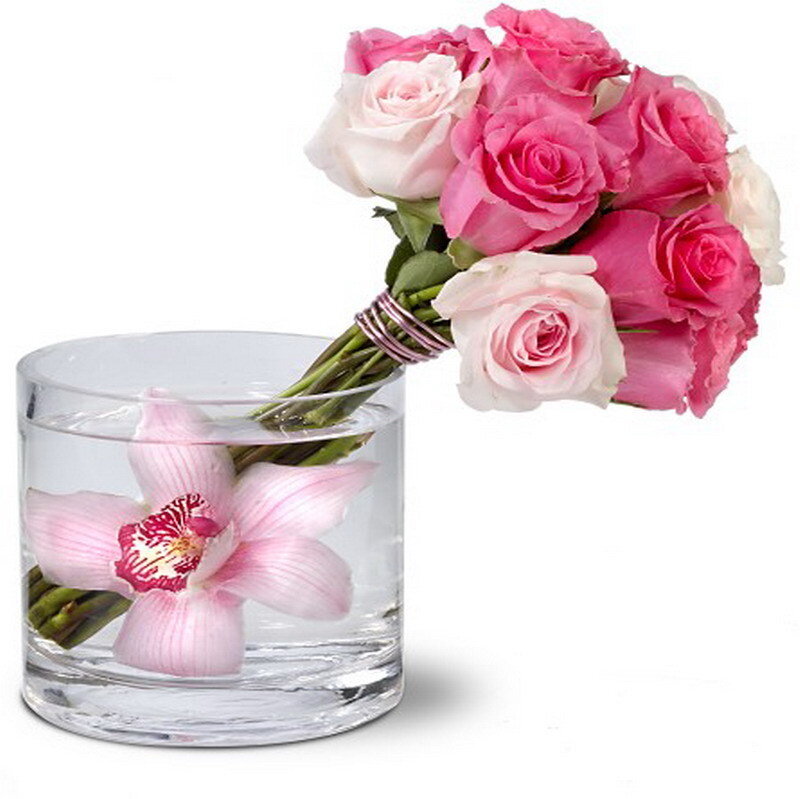 Pink roses and orchid in vase