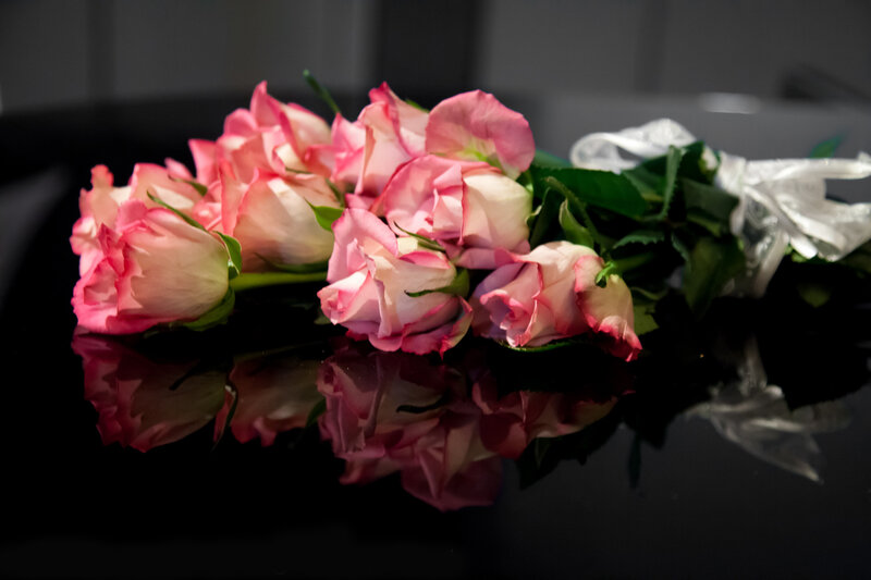 Pink Roses on Black Surface