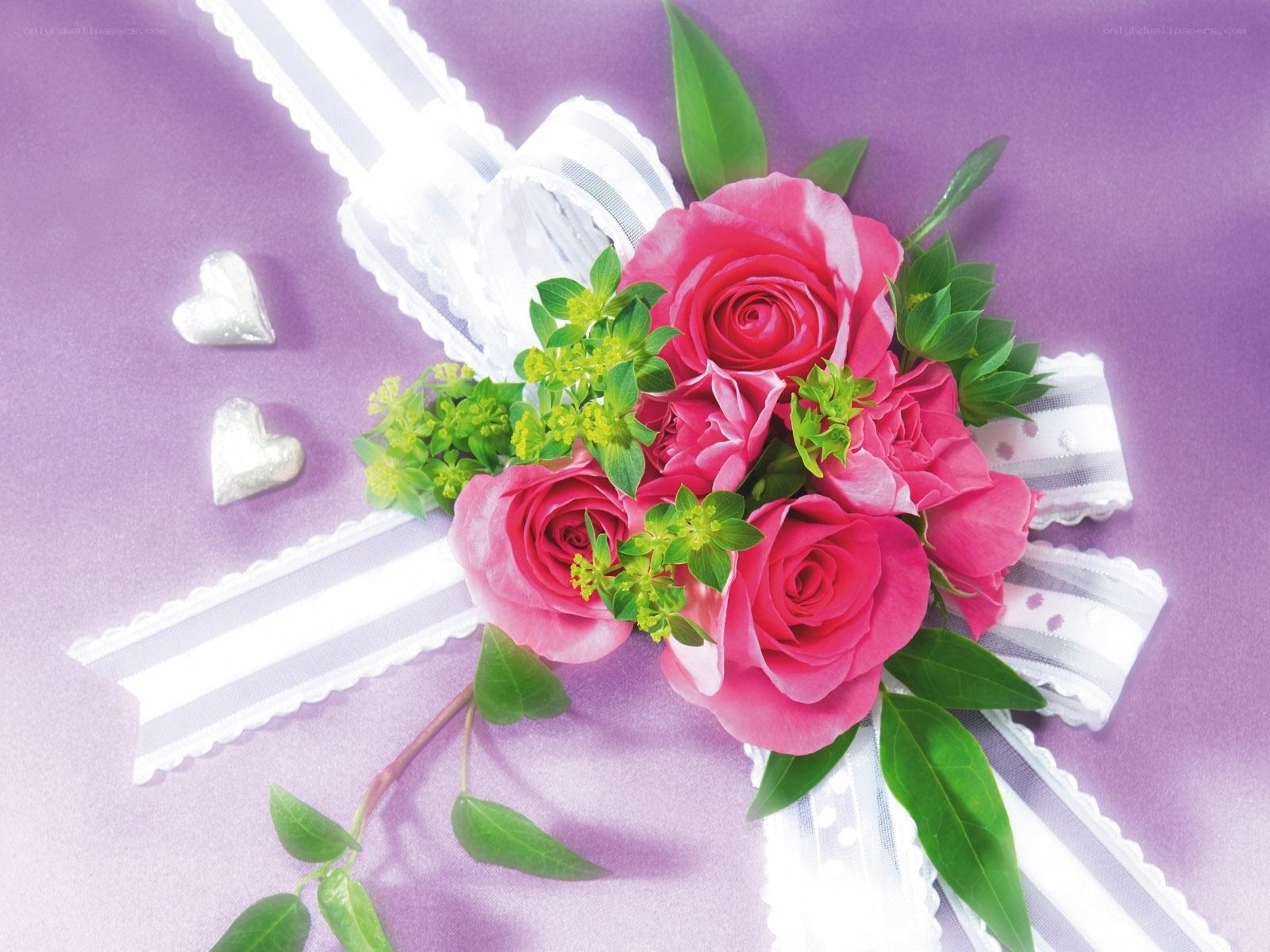 Pink roses with ribbon