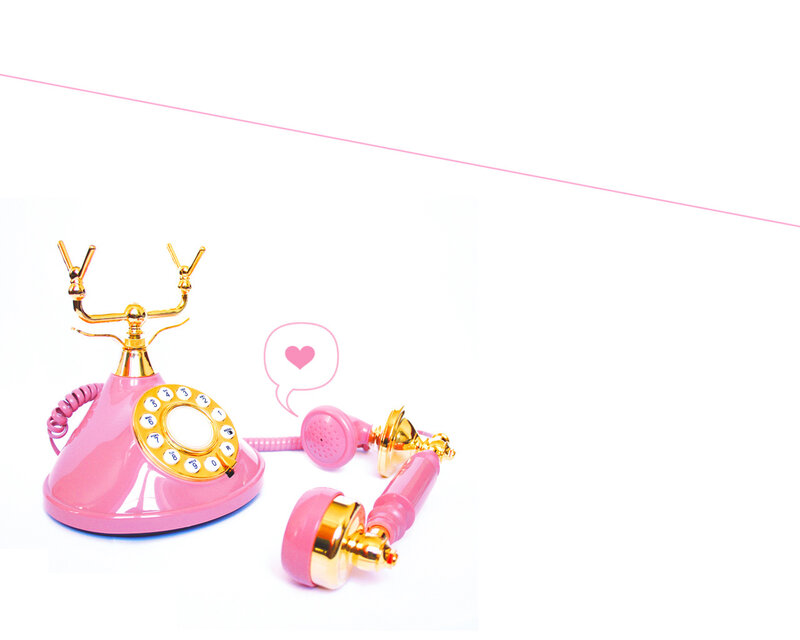 pink rotary phone with heart