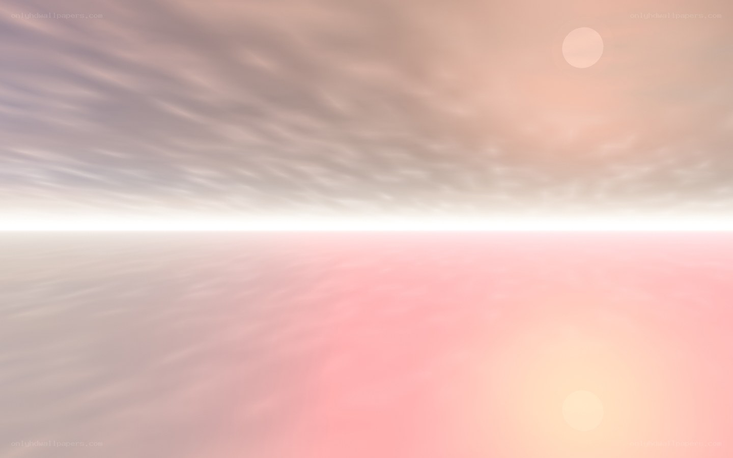 Pink sky over calm sea