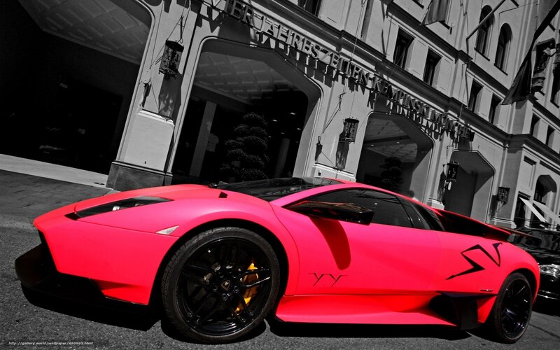 pink sports car on street