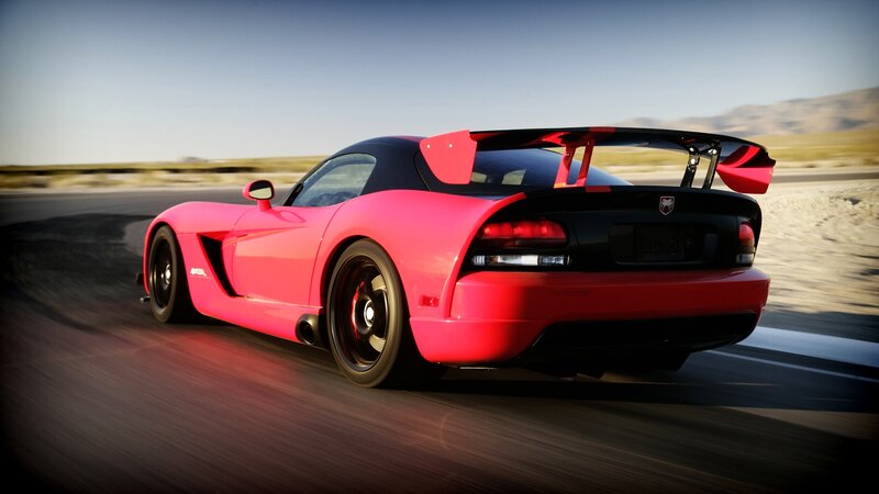 pink sports car on track