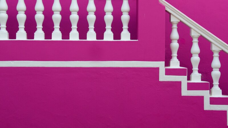Pink Staircase with White Railing