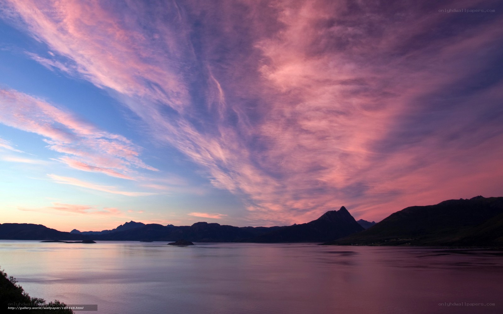 Pink sunset over a fjord