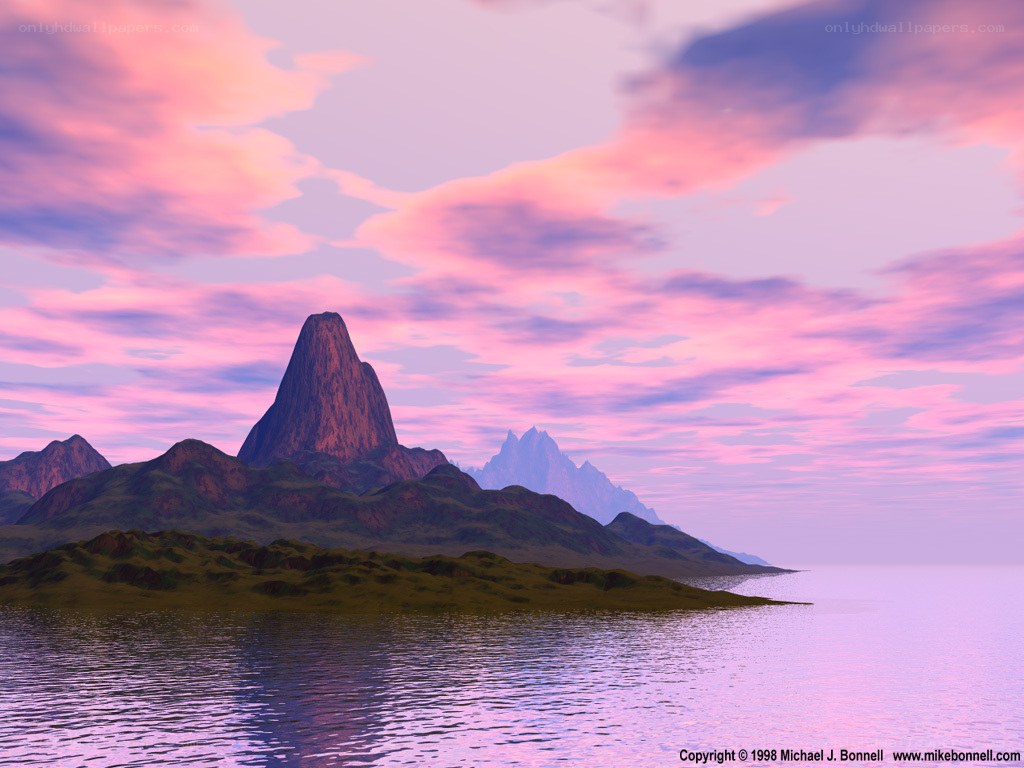 Pink sunset over mountainous island
