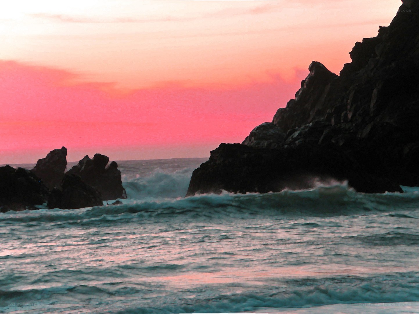 Pink sunset over rocky coast