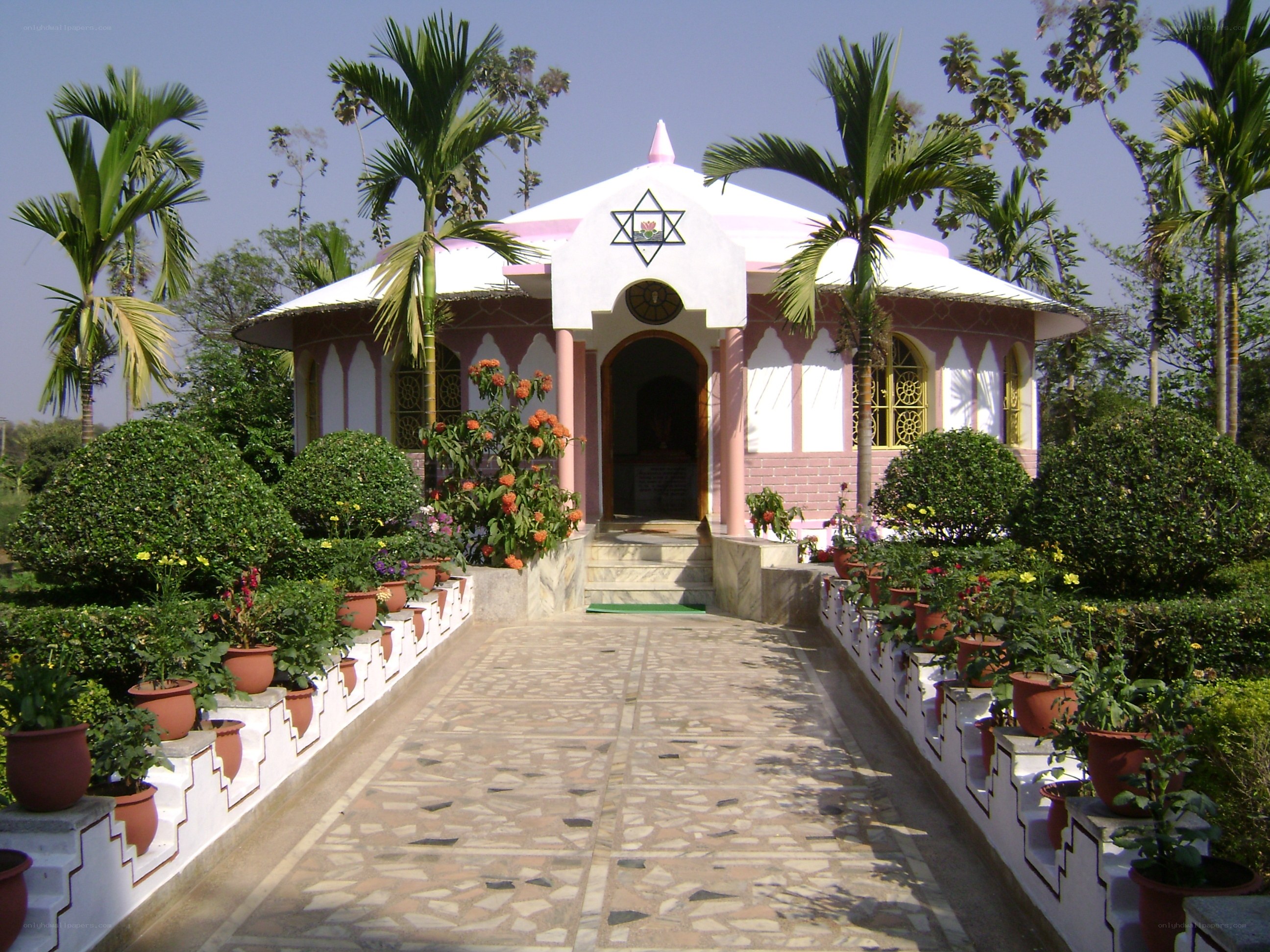 Pink temple with garden pathway