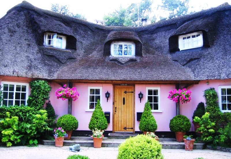 pink thatched cottage