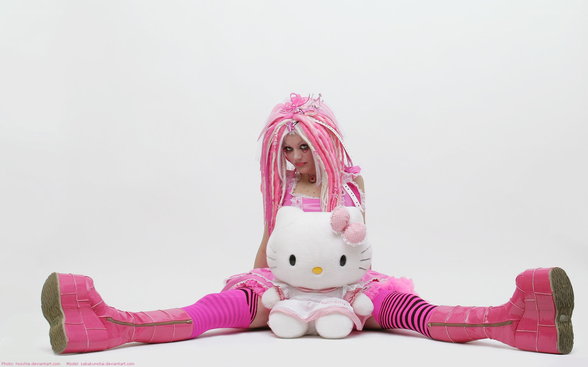 pink-themed cosplayer with hello kitty